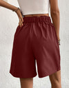 Pocketed Half Elastic Waist Shorts