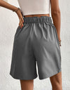 Pocketed Half Elastic Waist Shorts