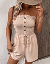 Perfee Decorative Button Smocked Strapless Romper