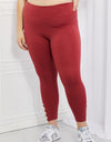 Yelete Ready For Action Full Size Ankle Cutout Active Leggings in Brick Red