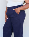 And The Why In The Mix Full Size Pleated Detail Linen Pants in Dark Navy