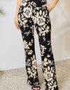 Heimish Full Size High Waist Floral Flare Pants