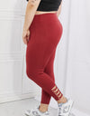 Yelete Ready For Action Full Size Ankle Cutout Active Leggings in Brick Red