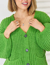 Pocketed Button Up Dropped Shoulder Cardigan