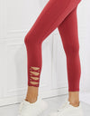 Yelete Ready For Action Full Size Ankle Cutout Active Leggings in Brick Red