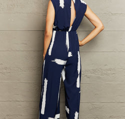Perfee Printed Round Neck Cutout Jumpsuit with Pockets