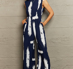 Perfee Printed Round Neck Cutout Jumpsuit with Pockets